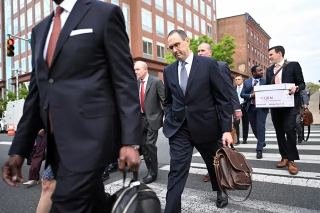 Lawyers for Fox News arrive at the courthouse on Tuesday