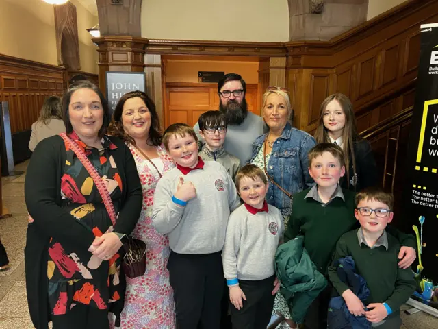 Members of the Hume family who are in Derry to see Bill Clinton