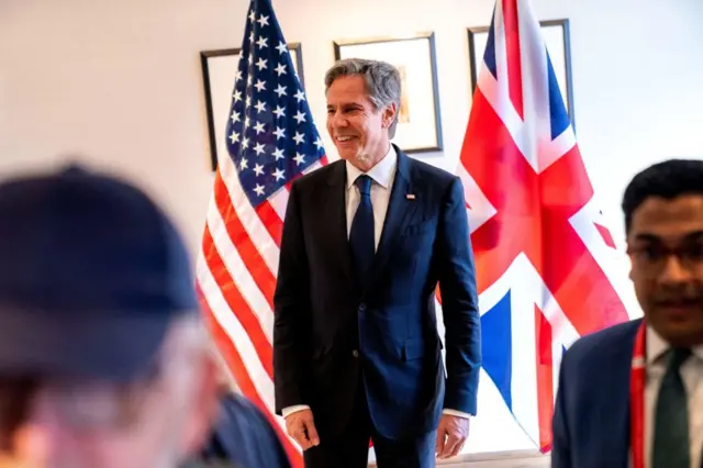 US Secretary of State Antony Blinken smiles after giving a joint statement with British Foreign Secretary James Cleverly on the situation in Sudan to members of the media during a G7 Foreign Ministers' Meeting at the Prince Karuizawa hotel in Karuizawa on April 17, 2023