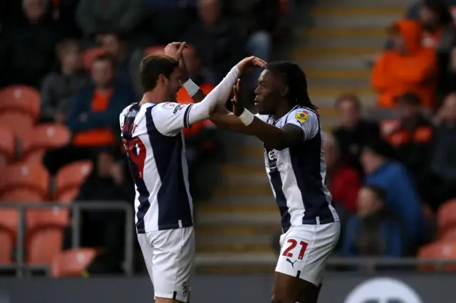 Brandon Thomas-Asante celebrates scoring for West Brom at Blackpool