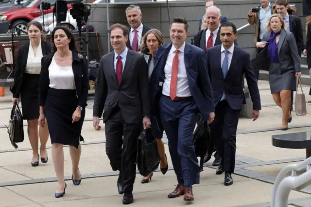 The Dominion Voting Systems legal team arrives at the courthouse in Wilmington, Delaware.