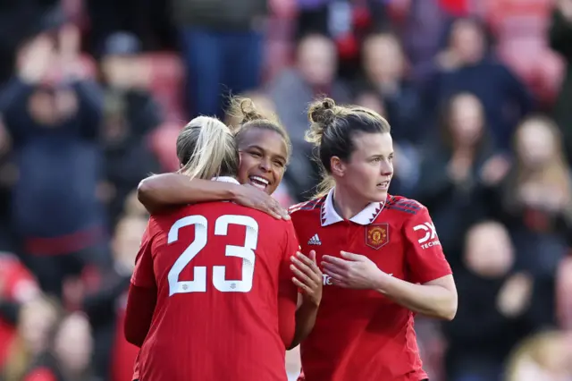 Nikita Parris celebrates her assist for the United goal.