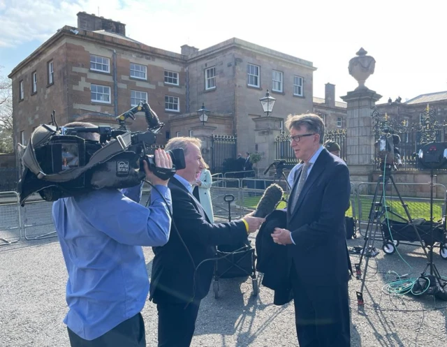 Lord Mandelson speaks to the BBC outside Hillsborough Castle