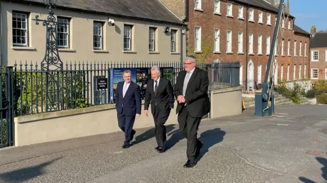 Sir Jeffrey Donaldson, Peter Robinson and Gavin Robinson arrive at Hillsborough Castle