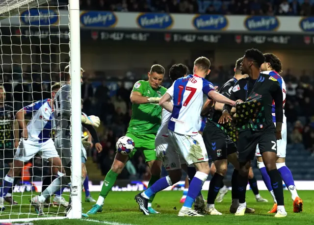 Coventry keeper Ben Wilson scores against Blackburn