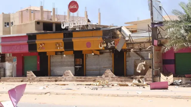 Damaged shops during the ongoing fighting between the Sudanese army and paramilitaries of the Rapid Support Forces (RSF) in Khartoum, Sudan - 19 April 2023