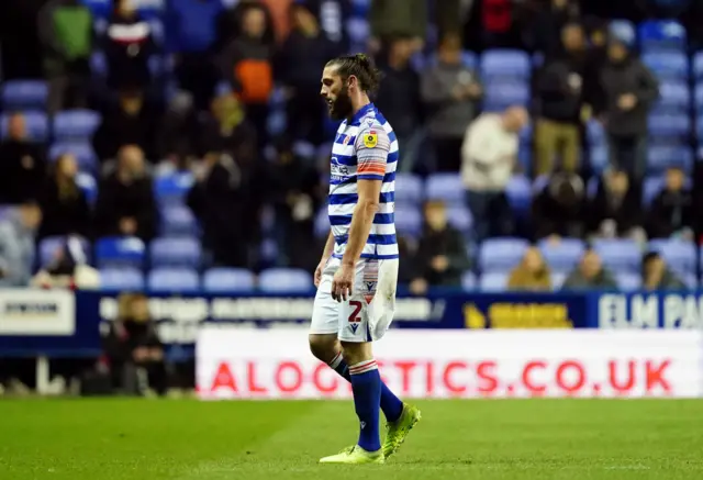 Andy Carroll leaves the pitch after being sent off