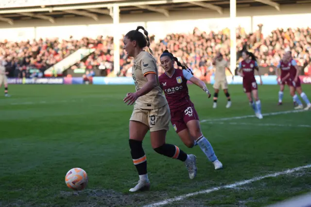 Johanna Rytting Kaneryd of Chelsea is challenged by Mayumi Pacheco of Aston Villa