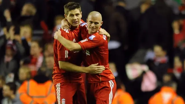 Paul Konchesky and Steven Gerrard playing for Liverpool