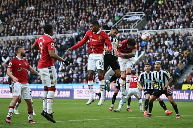 Newcastle United's English striker Callum Wilson heads home their second goal