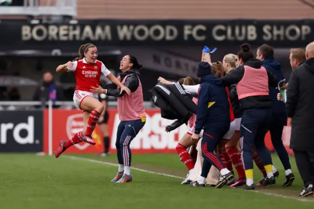 Katie McCabe of Arsenal celebrates with teammates