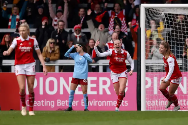 Frida Maanum of Arsenal celebrates after scoring the team's first goal