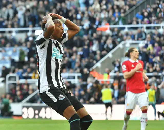 Newcastle United's Joe Willock with his hands on his head after missing a shot