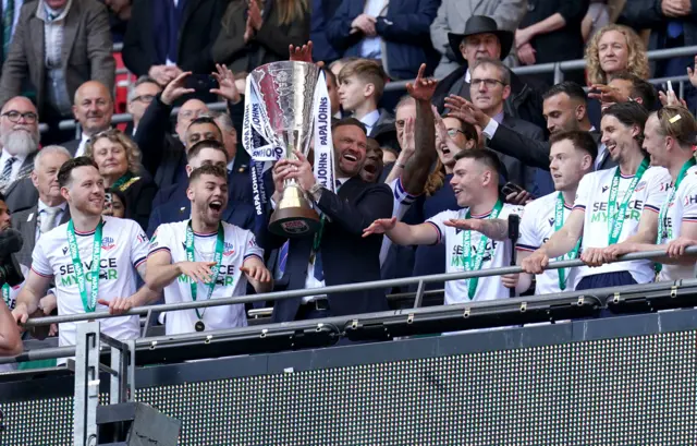 Ian Evatt with the Papa Johns Trophy