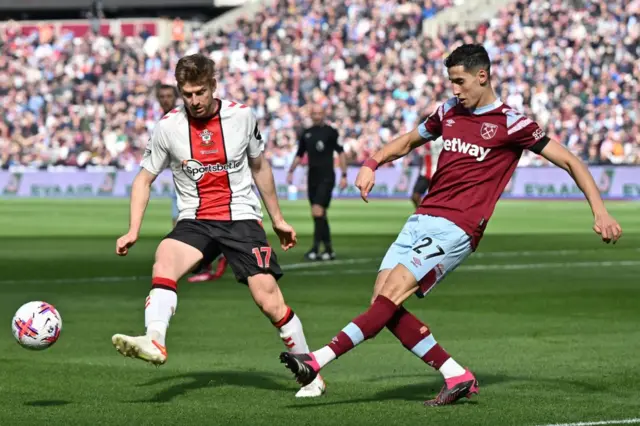 Stuart Armstrong challenges Nayef Aguerd