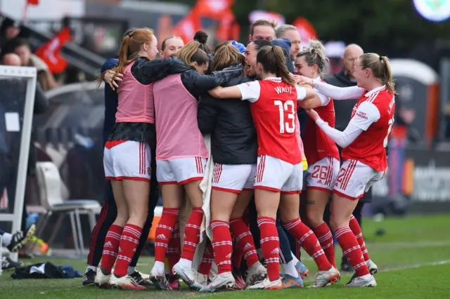 Katie McCabe of Arsenal celebrates with teammates