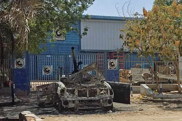 This picture shows a destroyed vehicle of the Rapid Support Forces (RSF) paramilitaries in southern Khartoum on April 19, 2023 amid fighting between Sudan's regular army and paramilitaries following the collapse of a 24-hour truc