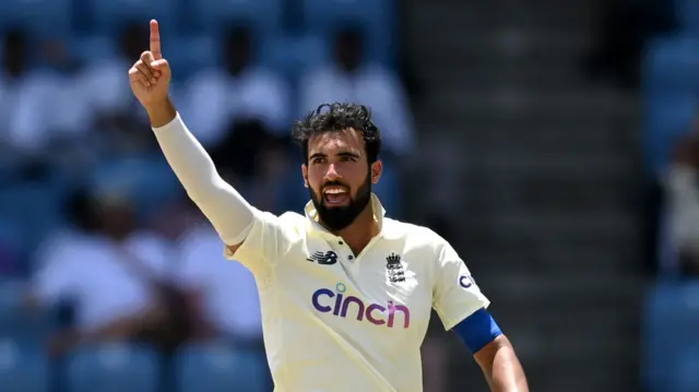 Saqib Mahmood bowling for England