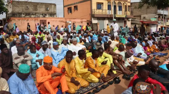 Muslims gather for Eid prayers on a street Cameroon’s capital, Yaoundé - 21 April 2023