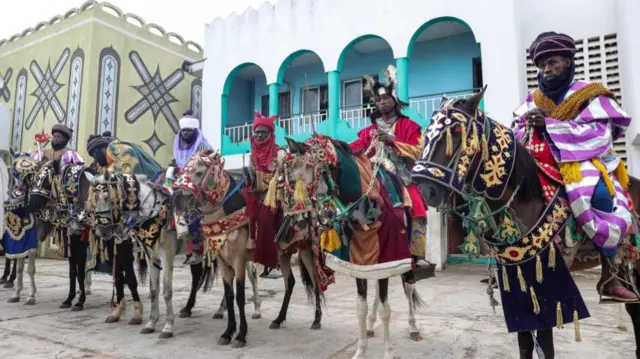 Horsemen are seen before a parade during the Durbar Festival in Ilorin on April 21, 2023