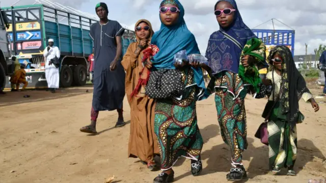 Children arrive for an Eid al-fitr prayers at Kara Isheri, Ogun State in south-west Nigeria - 21 April 2023