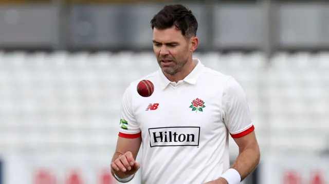 Jimmy Anderson bowling for Lancashire