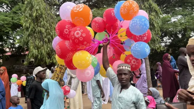 An Eid balloon seller in Abuja, Nigeria - 21 April 2023