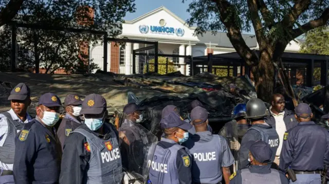 Police outside the UNHCR building in Pretoria, South Africa - 21 April 2023