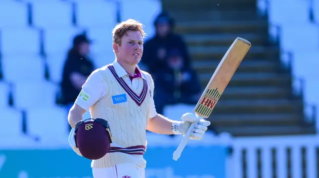 Somerset batter James Rew celebrates a century