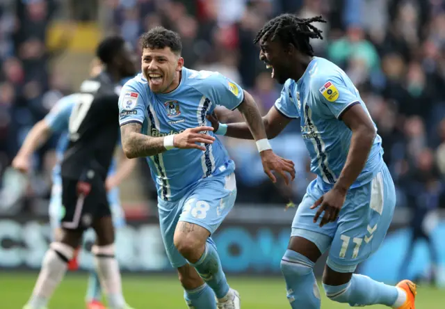 Gustavo Hamer celebrates scoring for Coventry