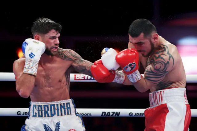 Joe Cordina punches Shavkatdzhon Rakhimov