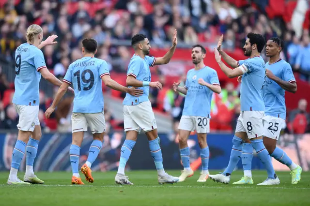 Manchester City's players celebrate