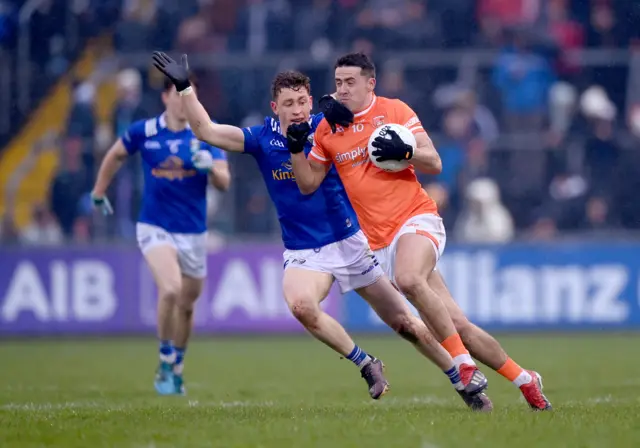 Stefan Campbell of Armagh in action against Ciarán Brady of Cavan