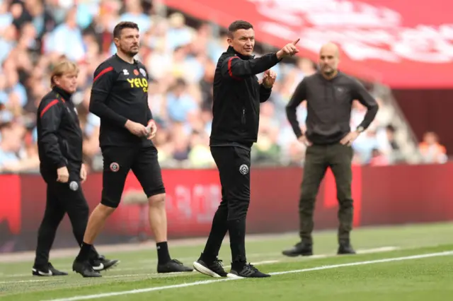 Paul Heckingbottom gives instructions to his players