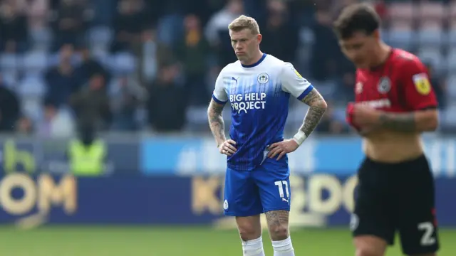 Wigan's James McClean looks dejected