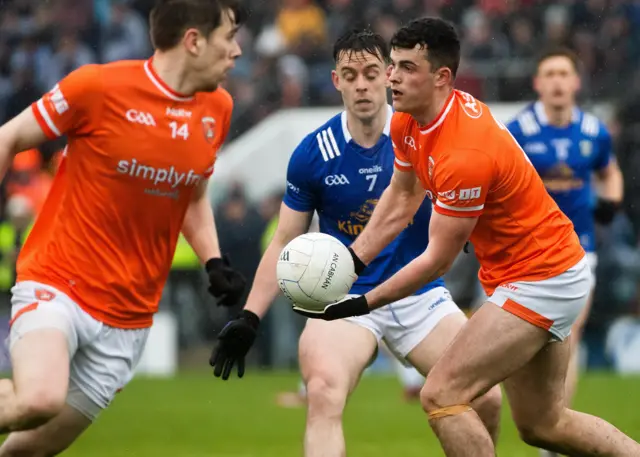 Conor O'Neill and Gerard Smith in action during the Ulster Championship quarter-final