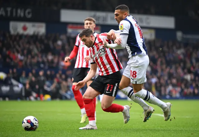 West Brom's Karlan Grant tries to get around Sunderland's Lynden Gooch