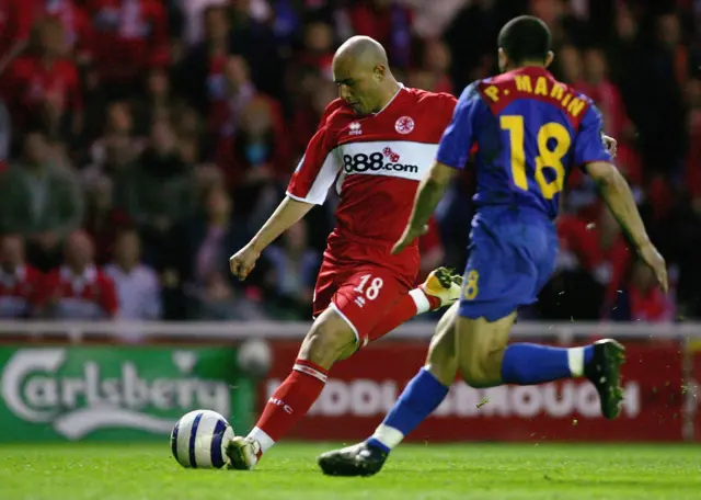 Massimo Maccarone gets a shot away for Middlesbrough