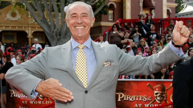 Len Goodman posing on the red carpet