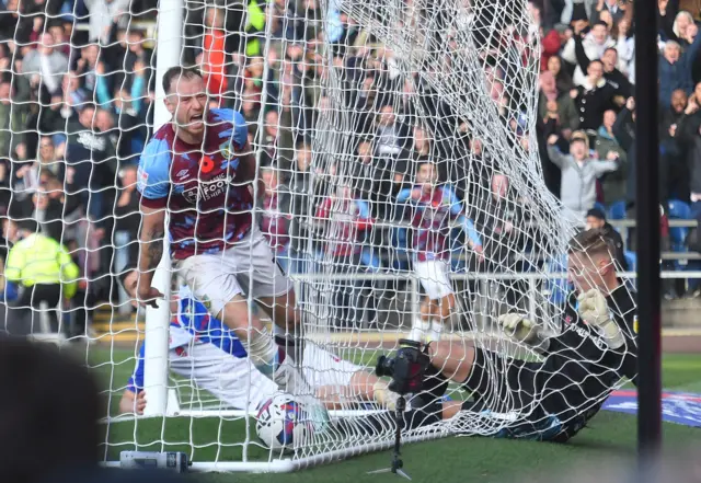 Ashley Barnes leaves Blackburn goalkeeper Thomas Kaminski in the net after a goal for Burnley