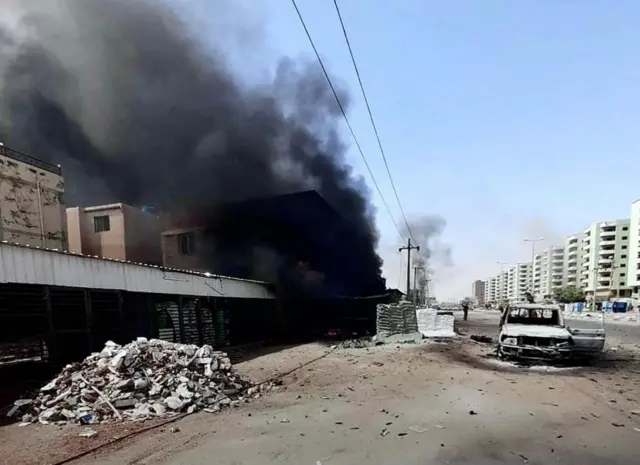 A battle-damaged street in Khartoum on 23 April