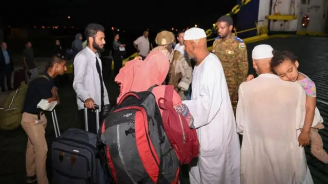 People are evacuated due to clashes between the paramilitary Rapid Support Forces and the Sudanese army, in Port Sudan, Sudan, April 25, 2023.