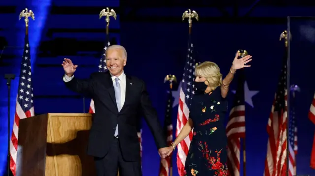 Joe Biden and his wife Jill celebrate onstage at his 2020 presidental election victory rally