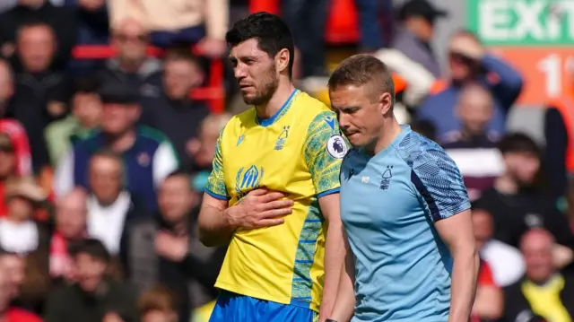 Nottingham Forest's Scott McKenna goes off against Liverpool