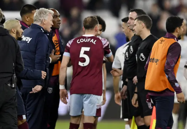 West Ham United manager David Moyes talks to referee Chris Kavanagh after the match