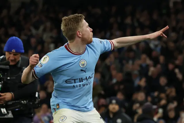 Kevin de Bruyne celebrates scoring Manchester City's third goal against Arsenal