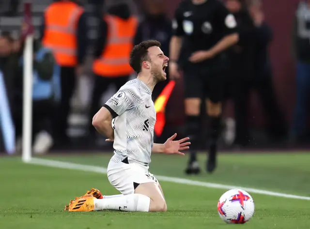 Liverpool forward Diogo Jota screams in pain