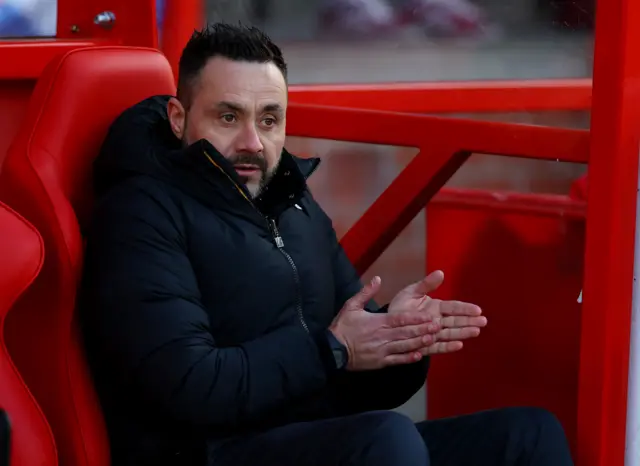 Brighton manager Roberto de Zerbi in the dugout at the city Ground