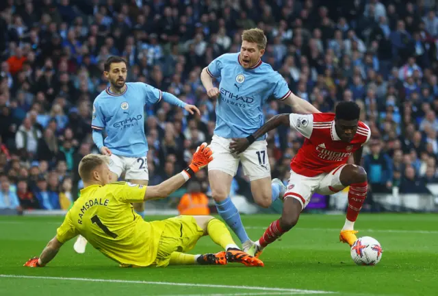 Thomas Partey and Kevin de Bruyne clash at the Etihad