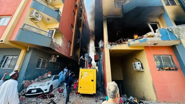 A view of the area as a fire broke out after a house was hit in the Lamab district during clashes between the Sudanese Armed Forces and the paramilitary Rapid Support Forces (RSF) in Khartoum, Sudan on April 20, 2023.